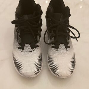 Under Armour Kids cleats - Black and White